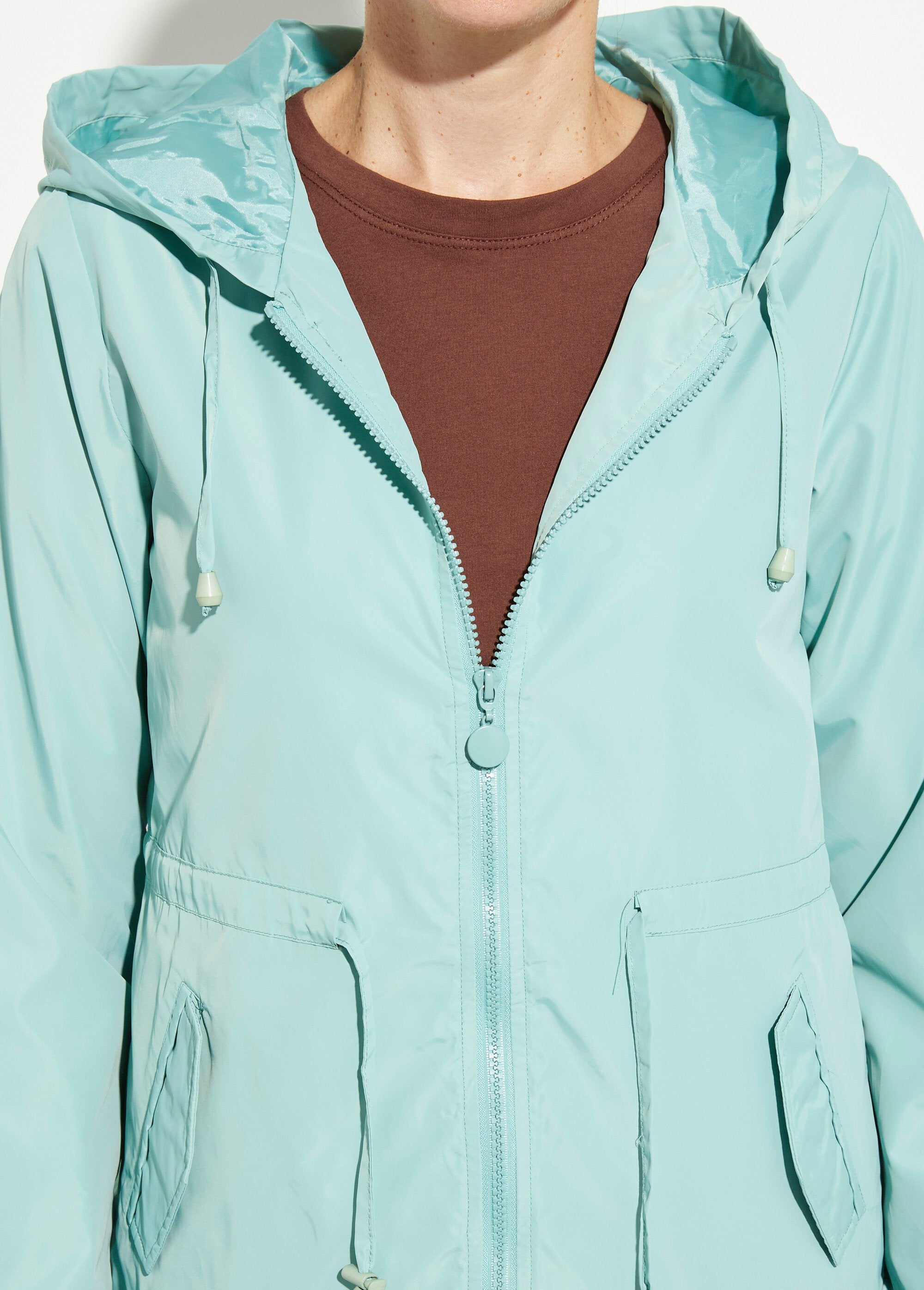 Coupe-vent_capuche_et_taille_resserrée_Vert_d_eau_DE1_slim