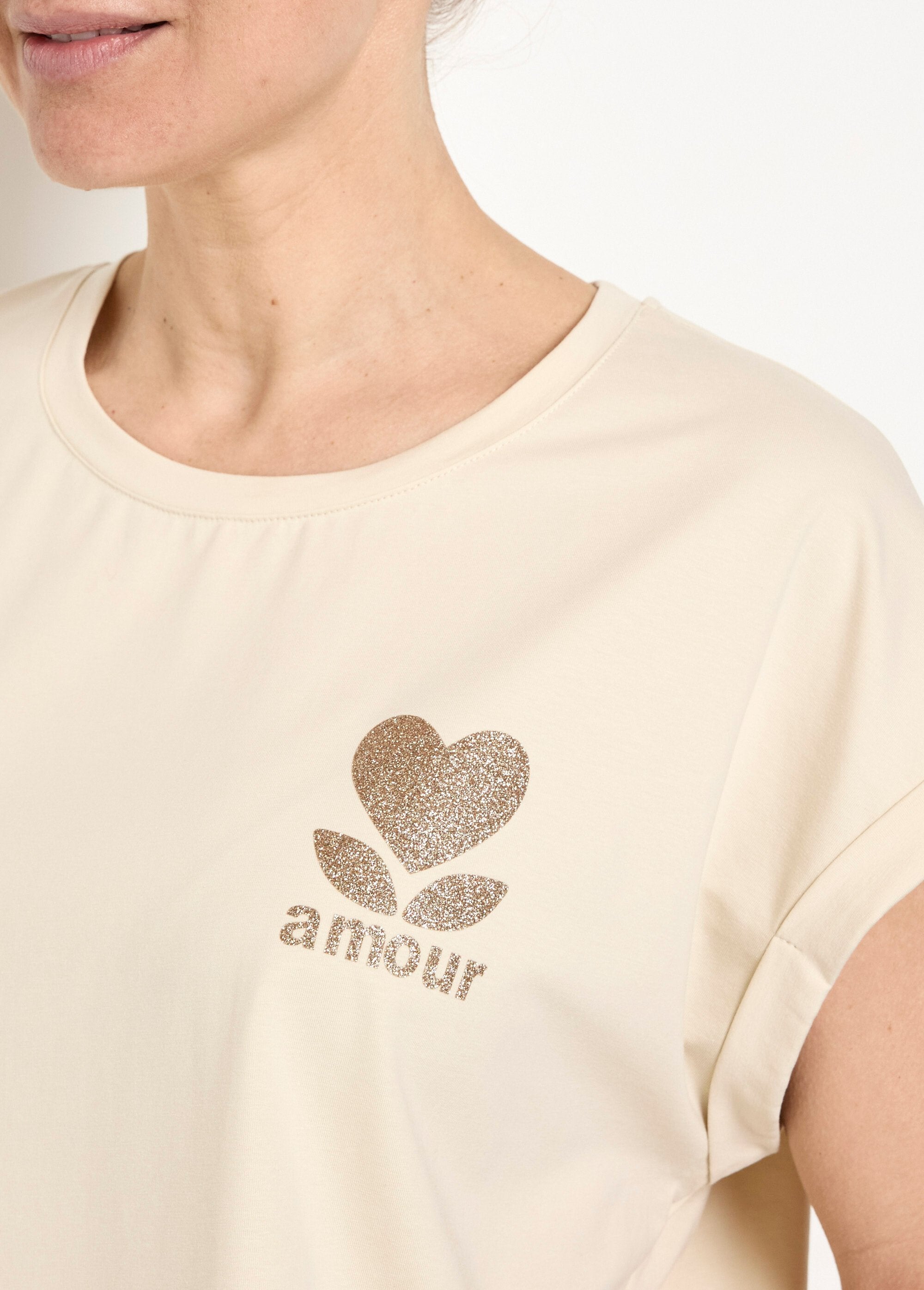 T-shirt_met_korte_mouwen_en_glitterboodschap_Beige_DE1_slim