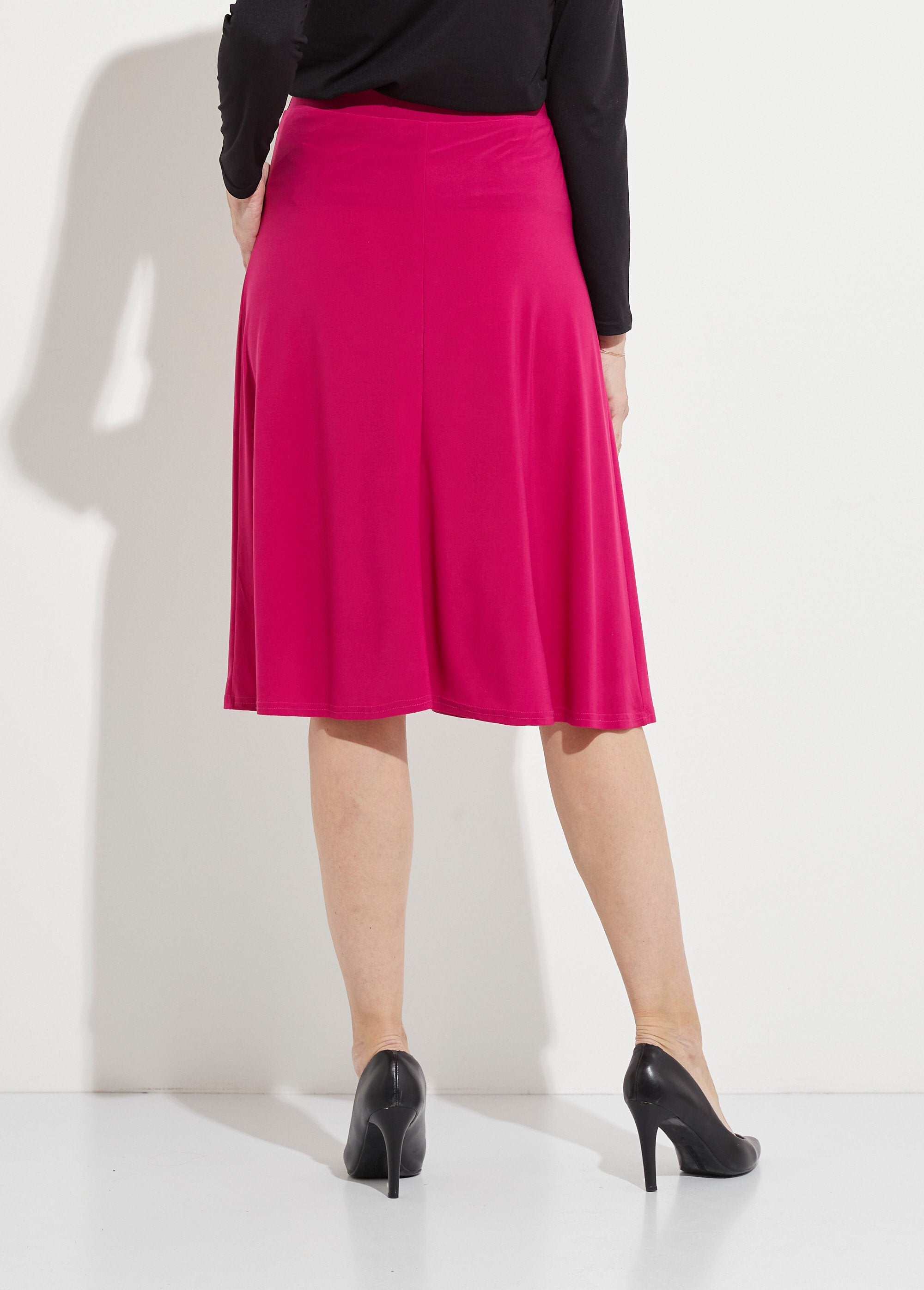Uitlopende_rok_tot_halverwege_de_lengte_in_effen_breisel_met_brug_Fuchsia_DO1_slim