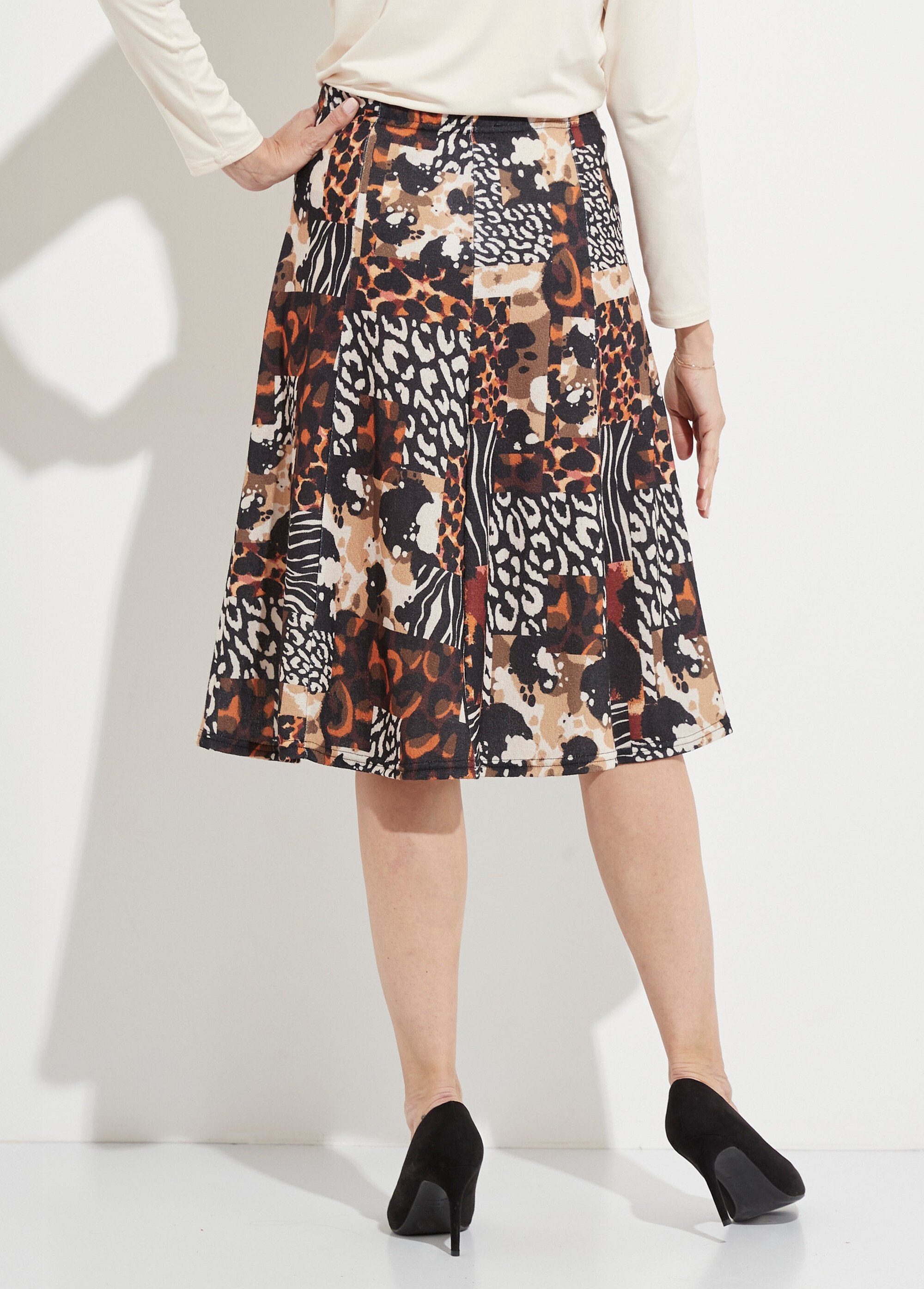 Jupe_évasée_mi_longue_motif_animalier_maille_chaude_Noir_et_orange_DO1_slim